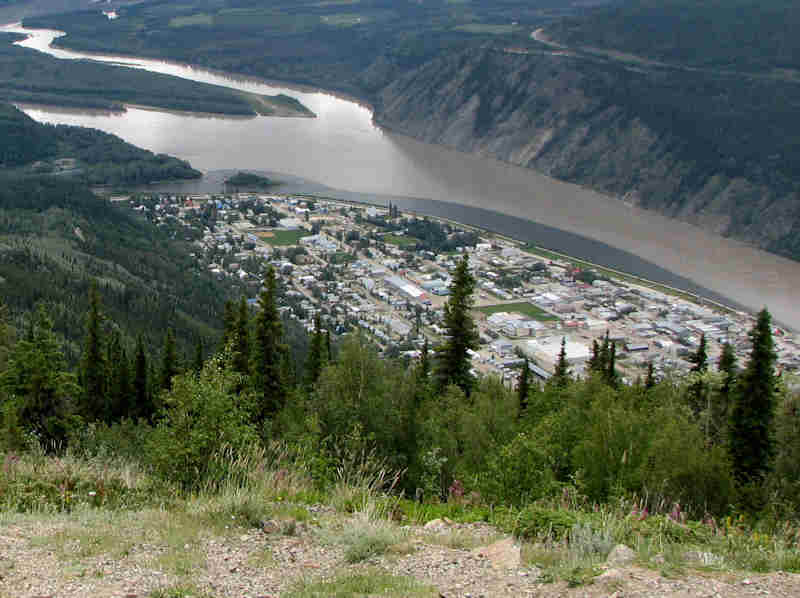 Dawson City, Yukon. Note the Klondike River (mud-free) as it enters the Yukon River
